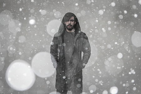 man wearing coat with bokeh effect thumbnail