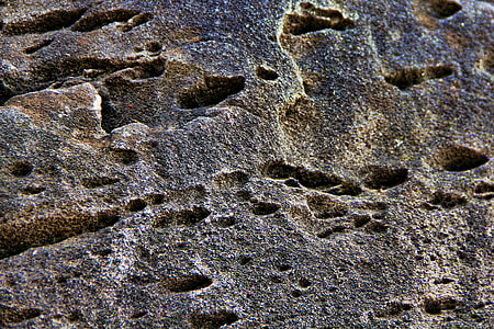 photo of black holed concrete surfae thumbnail