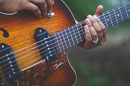 person playing acoustic guitar thumbnail