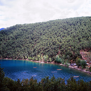 Boats on the Lugu Lake in China thumbnail