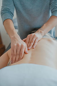 person massaging persons back thumbnail