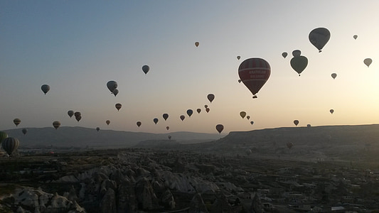 silhouette of hot air balloons during daytime thumbnail