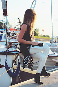 woman sitting on boat thumbnail