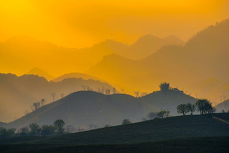 green coated hills during sunset thumbnail