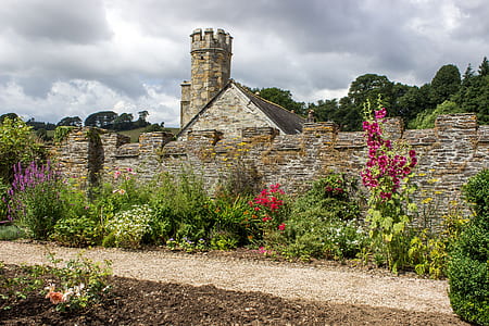 gray castle under gray cloudy sky thumbnail
