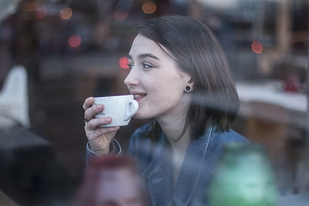 woman holding cup thumbnail