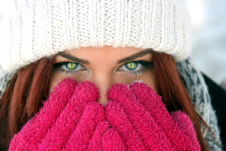 person wearing white knitted hat thumbnail