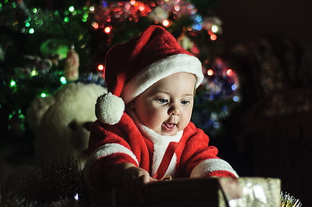 boy holding green gift box thumbnail
