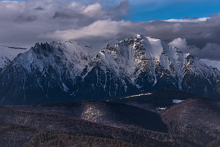 mountain landscape with snow during daytime thumbnail