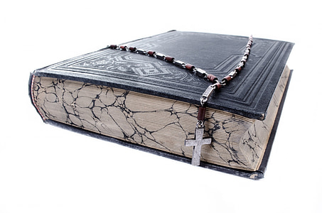 black bible and brown rosary thumbnail