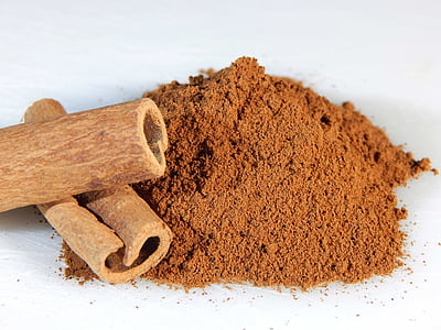 cinnamon powder and two rolls thumbnail