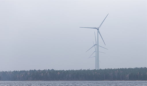white windmills in line thumbnail