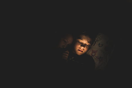 boy and woman sleeping beside each other thumbnail