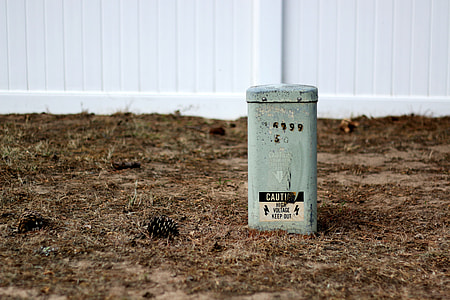 selective focus photo of rectangular gray metal container on ground thumbnail
