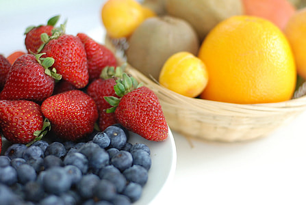 selective focus photography of plate of strawberries thumbnail