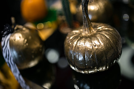 Golden ornamental pumpkins with cactuses thumbnail