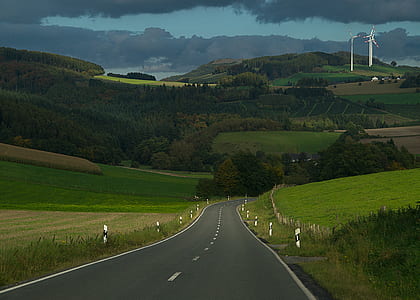 asphalt road during daytime thumbnail