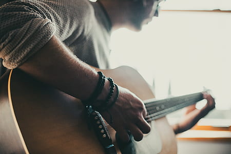 person playing guitar thumbnail