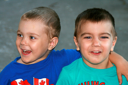 two boys smiling thumbnail