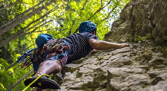 man climbing cliff thumbnail