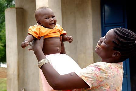 woman lifting baby thumbnail