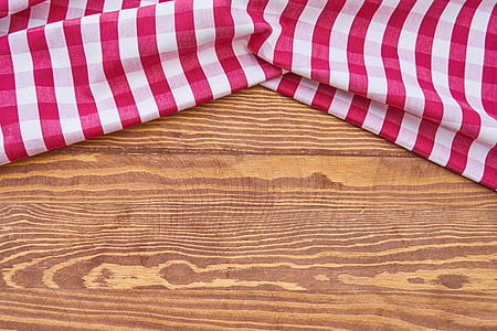 white and red gingham tablecloth on table thumbnail