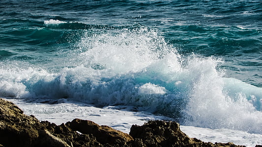 wave of the beach at the coastal rock thumbnail