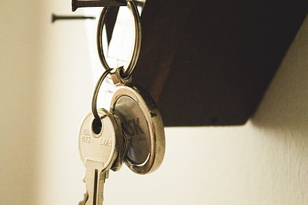 silver key and keychain thumbnail