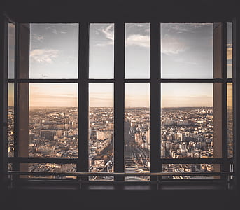 view of city inside building with glass window thumbnail