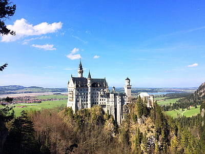 white castle near body of water during daytime thumbnail