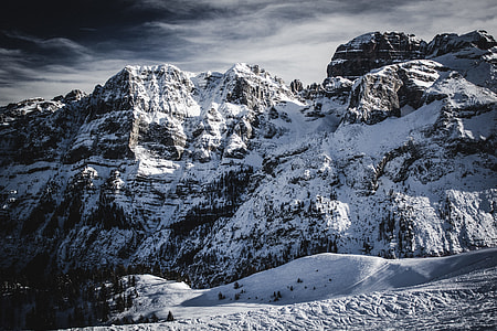 snow covered mountain under white clouds thumbnail