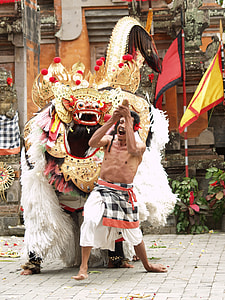 man standing near dragon made costume thumbnail