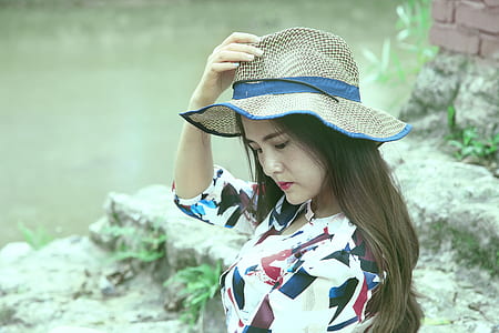 woman in hat and long-sleeved top thumbnail
