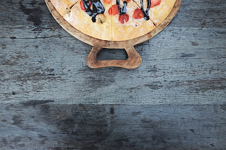 baked pizza on board thumbnail