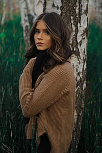 Woman Standing Beside Tree thumbnail