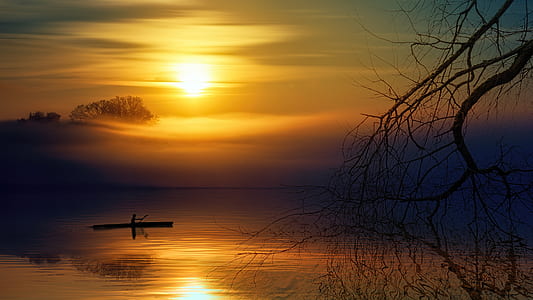 person riding boat on body of water thumbnail