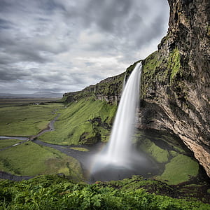 landscape photography of waterfalls thumbnail