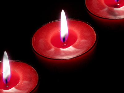 lighted red votive candle thumbnail
