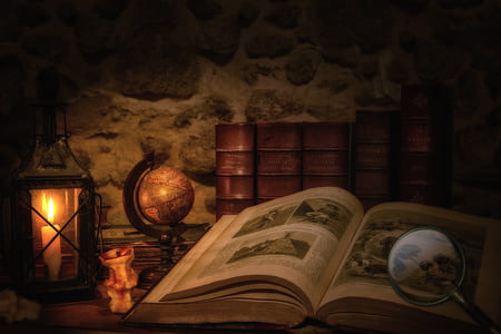 desk globe beside book thumbnail