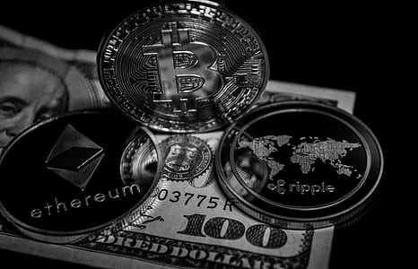 grayscale photography of three bitcoins thumbnail