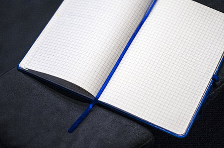 white ruled paper on gray surface thumbnail