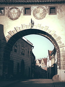 White Concrete Arch Alley during Daytime thumbnail
