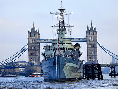 white and gray ship crossing Tower Bridge, London at daytime thumbnail