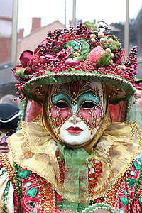 multicolored mask costume with fruit headdress thumbnail