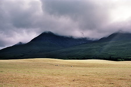 dark clouds over mountain thumbnail