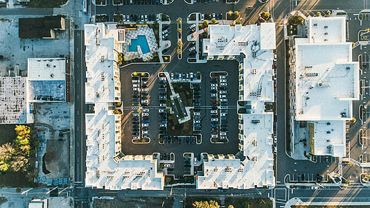 aerial photography of white concrete building at daytime thumbnail