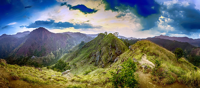 green mountains under cloudy skies thumbnail