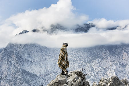 person standing on cliff thumbnail