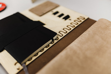 Architecture plans in an elegant leather bag thumbnail
