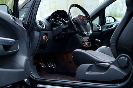black and gray vehicle interior in close-up photo thumbnail